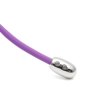 Purple silicone strap and chrome charging ports for Kitty kegel vibrator