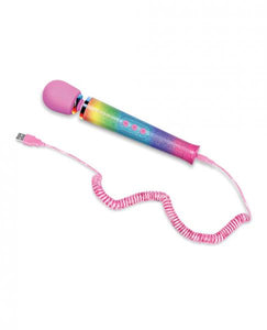 Le Wand All That Glimmers Petite Vibrating Wand with Rainbow Ombre Design and Pink Silicone Head and pink spiral charging cord on a white background